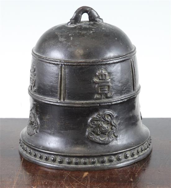 A Chinese or Japanese bronze small temple bell, 14cm